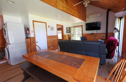 Meredith House | Modern lakefront home on Lake Waukewan with spectacular fall folliage views!