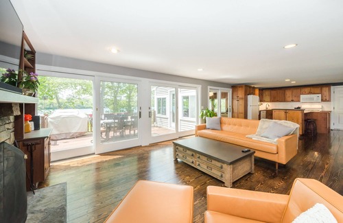 West Wareham House | Modern Lakefront Vacation Home with Private Dock, Great Views, & Water Toys!