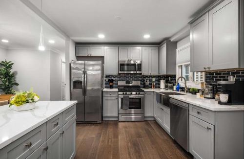 The Heights Apartment | Modern Luxe 2BR King Suite Easy trip to NYC
