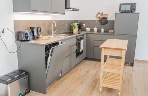 Bad Salzuflen Apartment | Modern luxury apartment with parking space and balcony | HOMELY HUB APARTMENTS