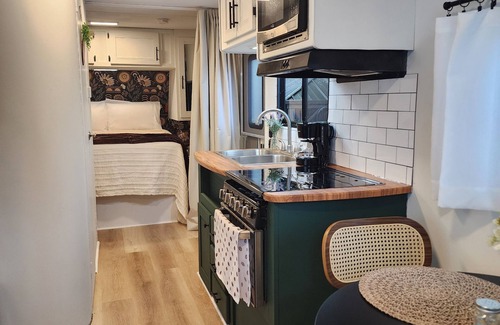 Homestead House | Modern mobile home with pool and private patio.