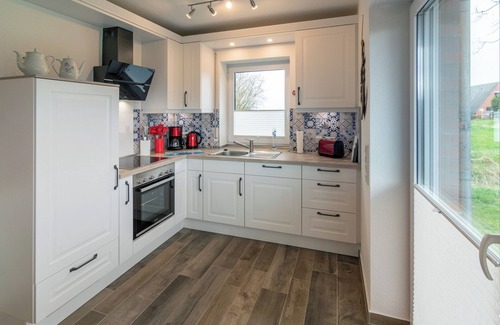 Westeraccumersiel Apartment | Modern new-build ground floor apartment with air conditioning and sweeping views