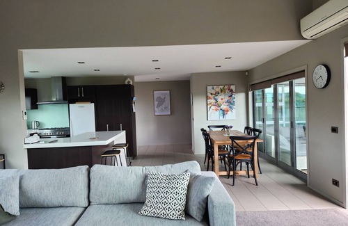 Wharewaka House | Modern, newly furnished house, with own putting green.