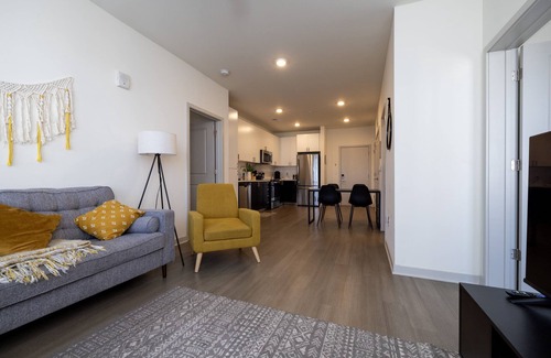 Downtown Louisville Apartment | Modern Nulu 2BR CozySuites 01