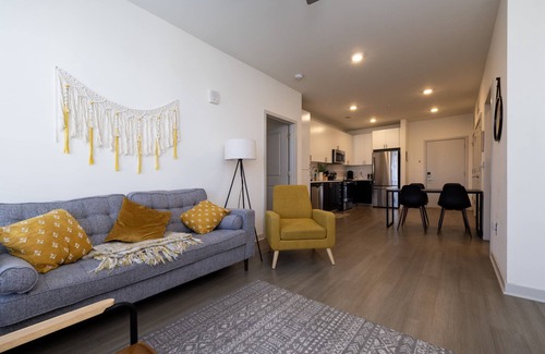 Downtown Louisville Apartment | Modern Nulu 2BR CozySuites 01
