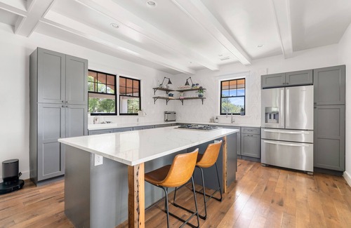 North Charleston House | Modern Park Circle Craftsman Cottage with Putting Green & Pool Table