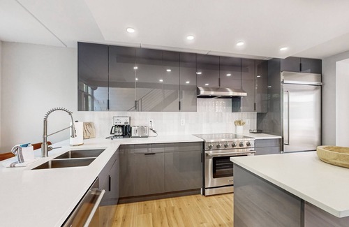 Canandaigua House | Modern penthouse condo with beautiful sunrises, lake view, & balcony
