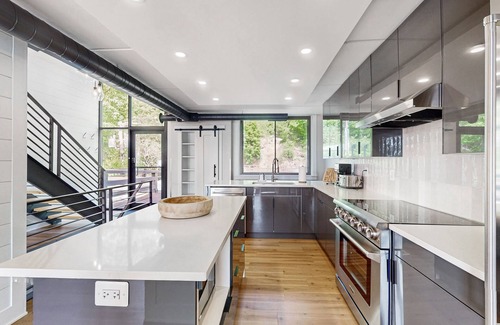 Canandaigua House | Modern penthouse condo with beautiful sunrises, lake view, & balcony