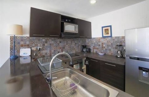 Playacar Condo | Modern PH one block to the beach