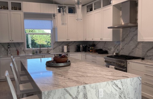 South Beach House | Modern pool with spa, 25 steps to private beach access.