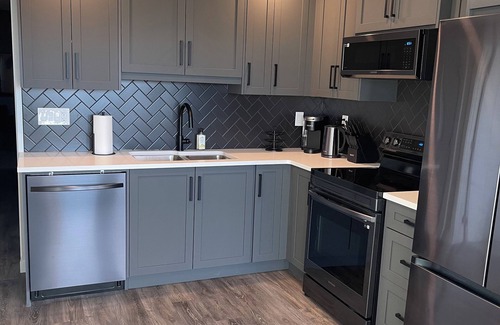 Southeast Calgary House | Modern, private & cozy 1 BR walkout suite in Seton