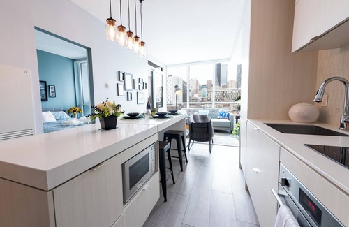 East Village House | Modern Rustic Hometel | 2BR 1BA | Smart home in DT