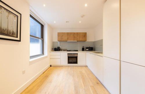 Swiss Cottage Apartment | Modern, Spacious Home with Patio
