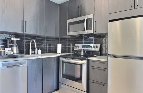 Five Points South Apartment | Modern Studio | Gym + Tesla Rides | Near UAB