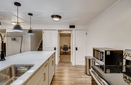 Harvey Park Condo | Modern suite w/yard and off-street parking!