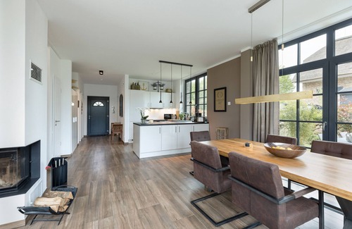 Hohenkirchen House | Modern thatched house "Haus Nautilus" with fireplace and sauna near the beach