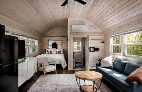Great Cacapon House | Modern Tiny Cabin with Game Room & Fire Pit in West Virginia