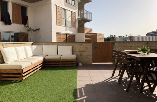 El Medano Apartment | Modern two floor apartment right by the beach with pool, patio and paddle court