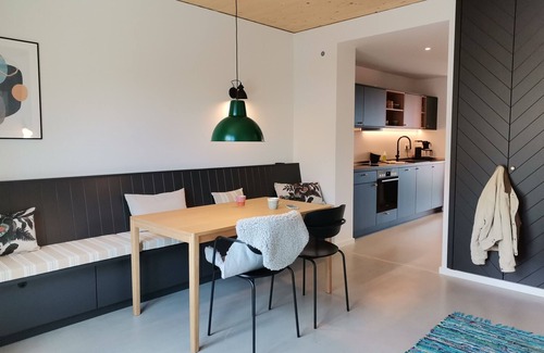 Hohwacht Apartment | Modern two-story apartment with rooftop terrace.