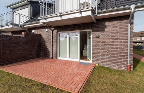 Westeraccumersiel Apartment | Modern vacation apartment Schnobkarl with terrace in Dornumersiel