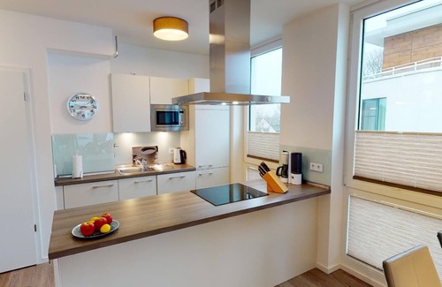 Pelzerhaken Apartment | Modern vacation apartment A-06 with balcony & sea view in Pelzerhaken