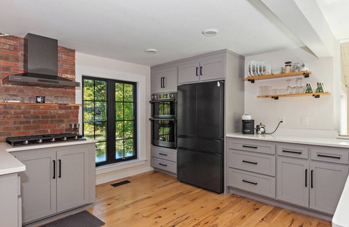 Versailles House | Modern Waterfront Retreat with Hot Tub & Pond Views/Pet-Friendly!