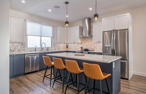 Silver Star Mountain House | Modern Whole Duplex - Sleeps 24! Both sides, 2 hot tubs, garages, ski in/out!