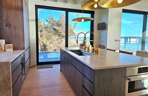 Aquebogue House | Modern Zen beach oasis with pool in Jamesport Bay.