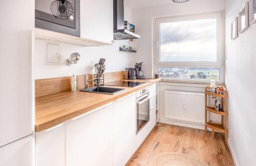 Steinbach Apartment | Moderne 2-Zimmer-Wohnung mit atemberaubender Skyline Aussicht auf Frankfurt!