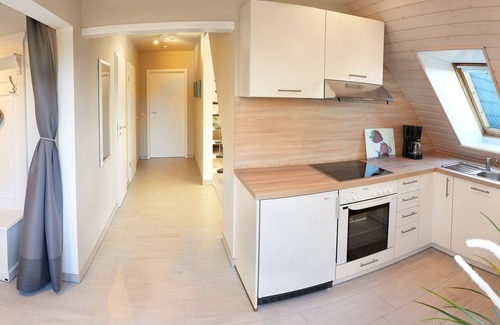 Bunsdorf Apartment | Moderne Ferienwohnung für bis zu 6 Personen am Wittensee mit Spielscheune