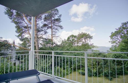 Lietzow Apartment | moderne Ferienwohnung mit Kamin, Balkon - Ferienresidenz Zwei Bodden FeWo111