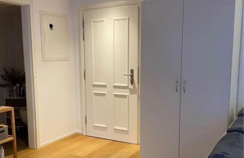 Unterseen Apartment | Moderno appartamento con balcone vista fiume e Monte Jungfrau