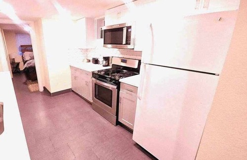 Greeley Apartment | Monopoly Themed 4br Downtown Apartment w/4 Queen Beds