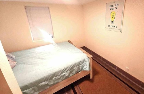 Greeley Apartment | Monopoly Themed 4br Downtown Apartment w/4 Queen Beds