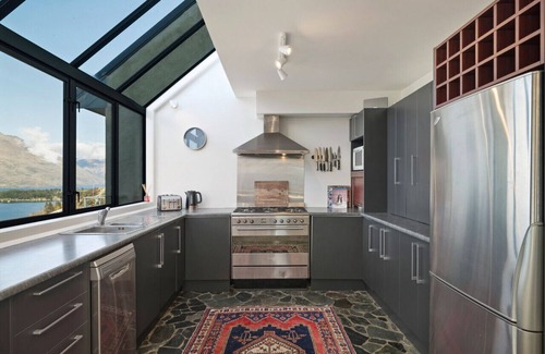 Queenstown House | Mountain and lake views and wood burner inside.