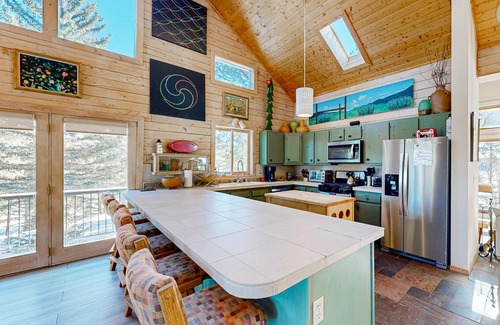 Angel Fire House | Mountain cabin with WiFi, expansive deck, fireplace, & forest views