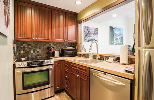 Glacier Condo | Mountain Modern Snowater condo! Fireplace, Pool, Spa, Sauna, indoor sports courts!
