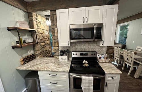 Black Mountain House | Mountain serenity in wooded setting with beautiful creek!
