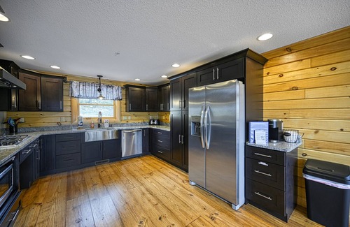 McHenry Cabin | Mountain-view home with hot tub, elevator, balcony, WiFi, AC, & pool table