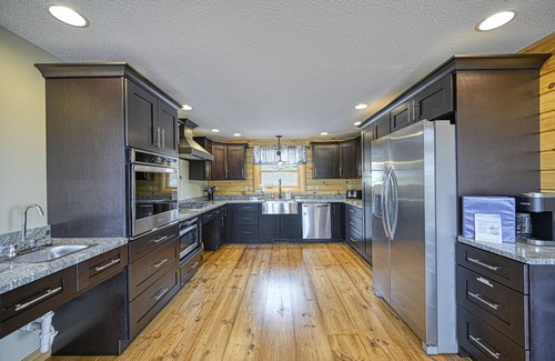 McHenry Cabin | Mountain-view home with hot tub, elevator, balcony, WiFi, AC, & pool table