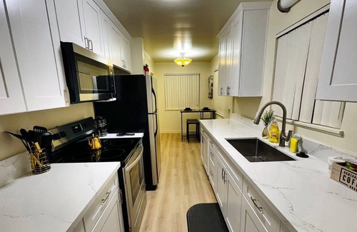 Central Sacramento Apartment | Movie Lover’s Themed Home! Queen suite + Snacks Included + HUGE TV!