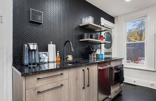 Victorian Village House | Mozart Flat with Hot Tub! Free Parking!