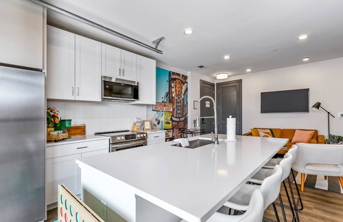 Rolling Mill Hill Condo | Muse | Downtown condo with fast WiFi, balcony, central AC & rooftop lounge