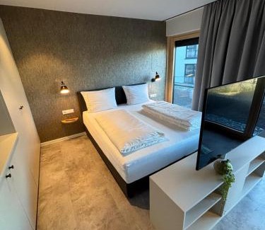 Meckenbeuren Apartment | My Flats Studio Apartements - klimatisiert - nahe Ravensburger Spiele