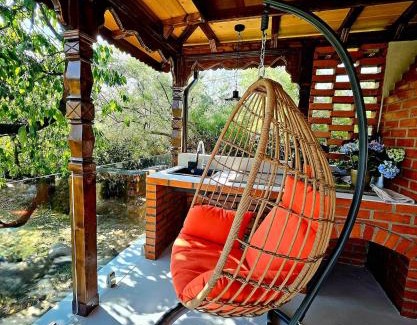 Curtea De Arges House | Nature Bungalow In the Family Garden - 5 min to City Center, Lake Access, Close to Lidl and Stunning Pool