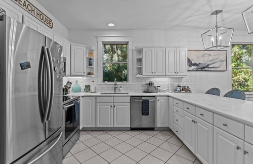 Bald Head Island House | Nature Lovers Dream Home Light & Bright Nestled in the Live Oaks Both Clubs