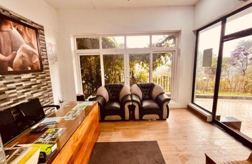 Giridih Hotel | Nature Valley Farmhouse Resort by Raarees, Munnar #lap of nature #premium rooms #parking #Scenic view #garden with fireplace #property of the year