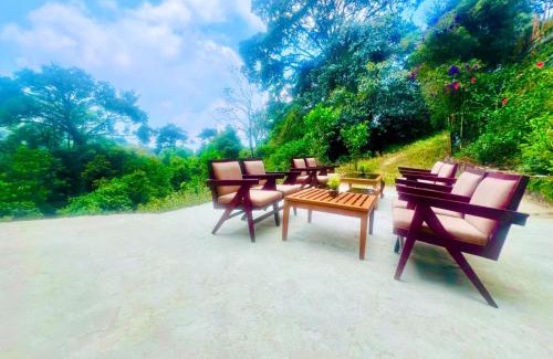 Giridih Hotel | Nature Valley Farmhouse Resort by Raarees, Munnar #lap of nature #premium rooms #parking #Scenic view #garden with fireplace #property of the year