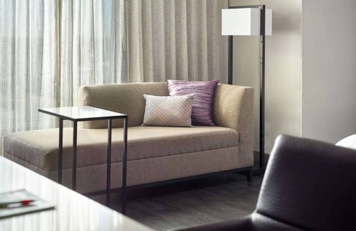 Downtown Hotel | Near Red Hat Amphitheater + Dining. Pool. Gym.