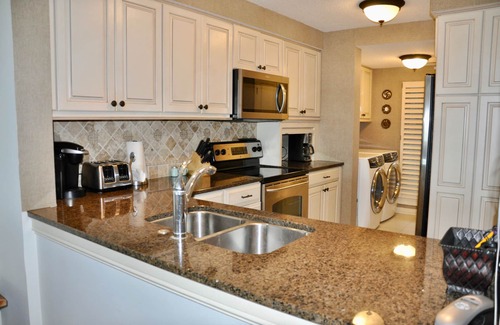 Palmetto Dunes Condo | NEVER use the elevator just 6 steps down lead to pool & beach PERFECT Location